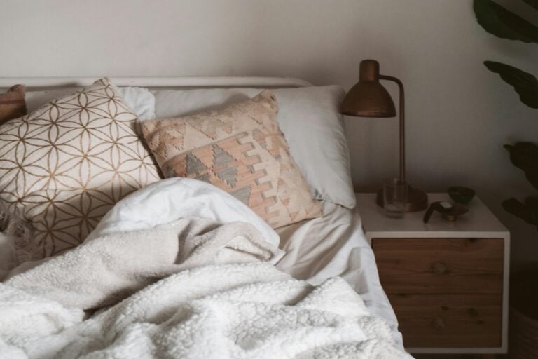 A Bed with Pillows and a Blanket