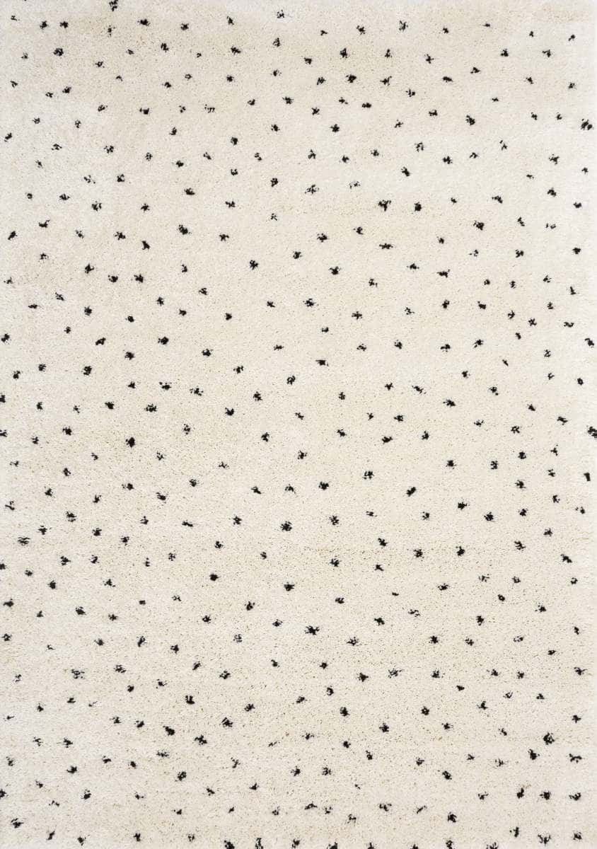 black and cream polka dot background