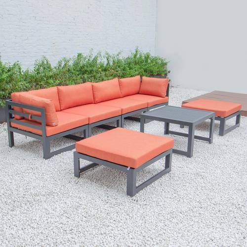 Chelsea 7-Piece Patio Ottoman Sectional And Coffee Table, Set Black Aluminum With Cushions Orange by LeisureMod