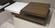 Action Walnut High Gloss White Three Tiered Motion Coffee Table by BH Furniture