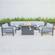 Chelsea 7-Piece Patio Sectional And Fire Pit Table Black Aluminum With Cushions Light Grey by LeisureMod