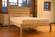 The Esmont Natural Platform Bed w/Headboard by Savvy Rest
