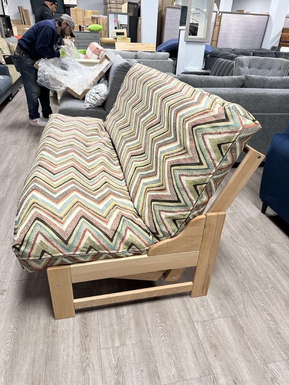 Futon in front of bed discount