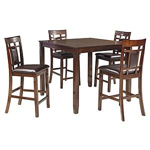 Bennox Brown Counter Height Dining Table & 4 Upholstered Bar Stools Set by Ashley Furniture