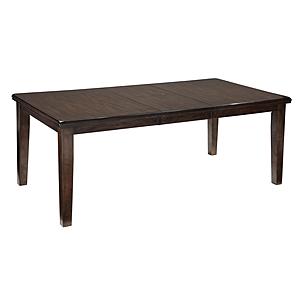Haddigan - Dark Brown Rectangular Dining Room Extension Table by Ashley Furniture