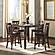 Bennox Brown Counter Height Dining Table & 4 Upholstered Bar Stools Set by Ashley Furniture