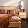 Grappa Natural Wood & Rattan Wavy Nightstand by TOV Furniture