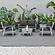 Walbrooke Modern White Patio Conversation With Round Fire Pit With Slats Design & Tank Holder, Charcoal by LeisureMod