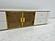 Kayla Oval White TV Stand w/Carrera Style Porcelain Top & Gold Trims by BH Furniture