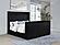 Centergrove Upholstered Eastern King Wingback TV Bed - Black by Coaster