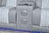 U8000 Grey Dual Power Sectional w/2 Recliners, Speaker & LED by Global Furniture